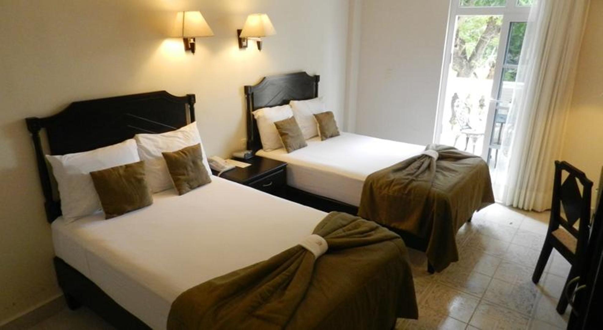 Hotel Victoria Mérida Εξωτερικό φωτογραφία A room at the hotel